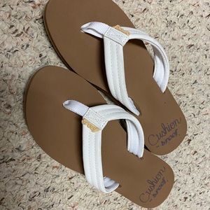 Reef white flip flops